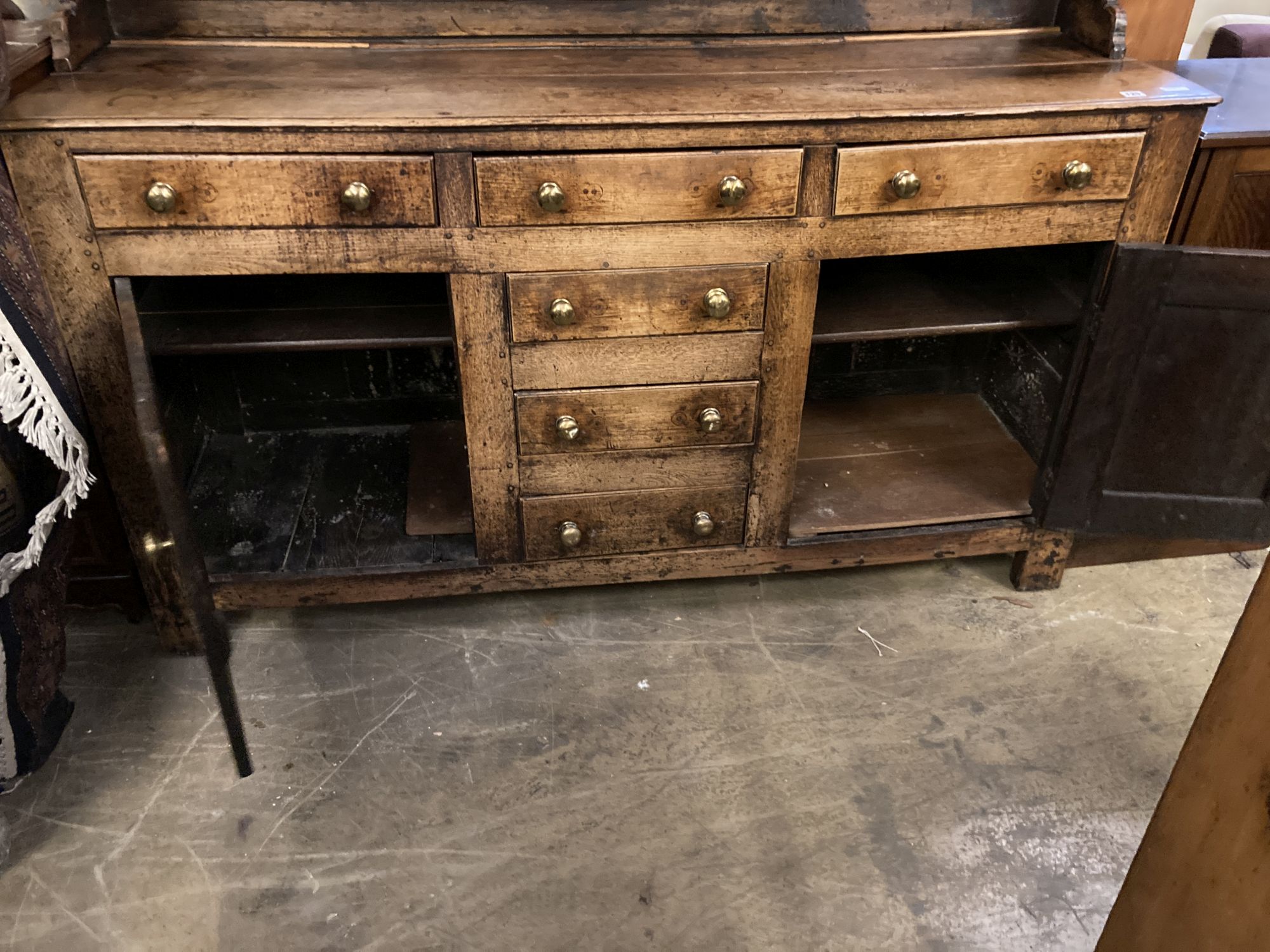 A George III oak dresser, width 170cm, depth 52cm, height 208cm